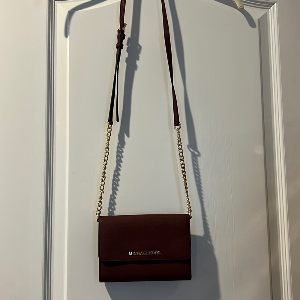 Michael Kors wallet on chain.